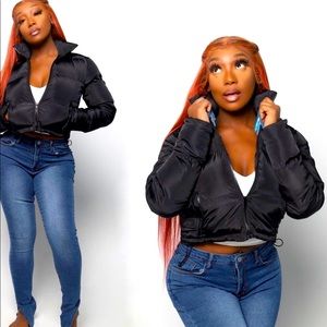 Black puffer jacket. Size L. Runs a little small.